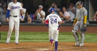 Michael Helman hits 2-run HR, make catch to prevent 2-run HR, as Rangers beat Brewers 5