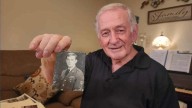 This combat veteran's photos froze moments of war. Now, he's reliving them on an Honor Flight