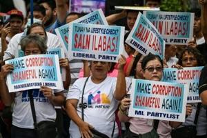 Philippines president says corruption scandal protests justified