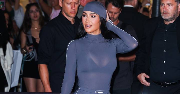 Kim Kardashian in Sheer Gray Bodysuit Deserves Second Glance