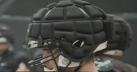 High school football teams using specialized caps to avoid concussions