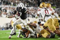 Chiles throws for career-high 4 TDs to lift Michigan State over Boston College