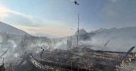 Fire crews working to contain a wildfire just west of Banff townsite