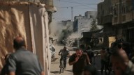 Israeli strikes kill at least 32 across Gaza City, health officials say