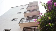 Urge una ley que garantice derechos a la vivienda y frene la gentrificación: Airbnb