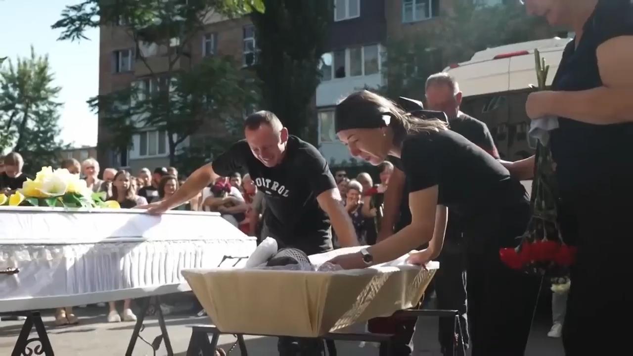 Funeral held in Kyiv for mother and 2-year-old daughter killed in Russian strikes