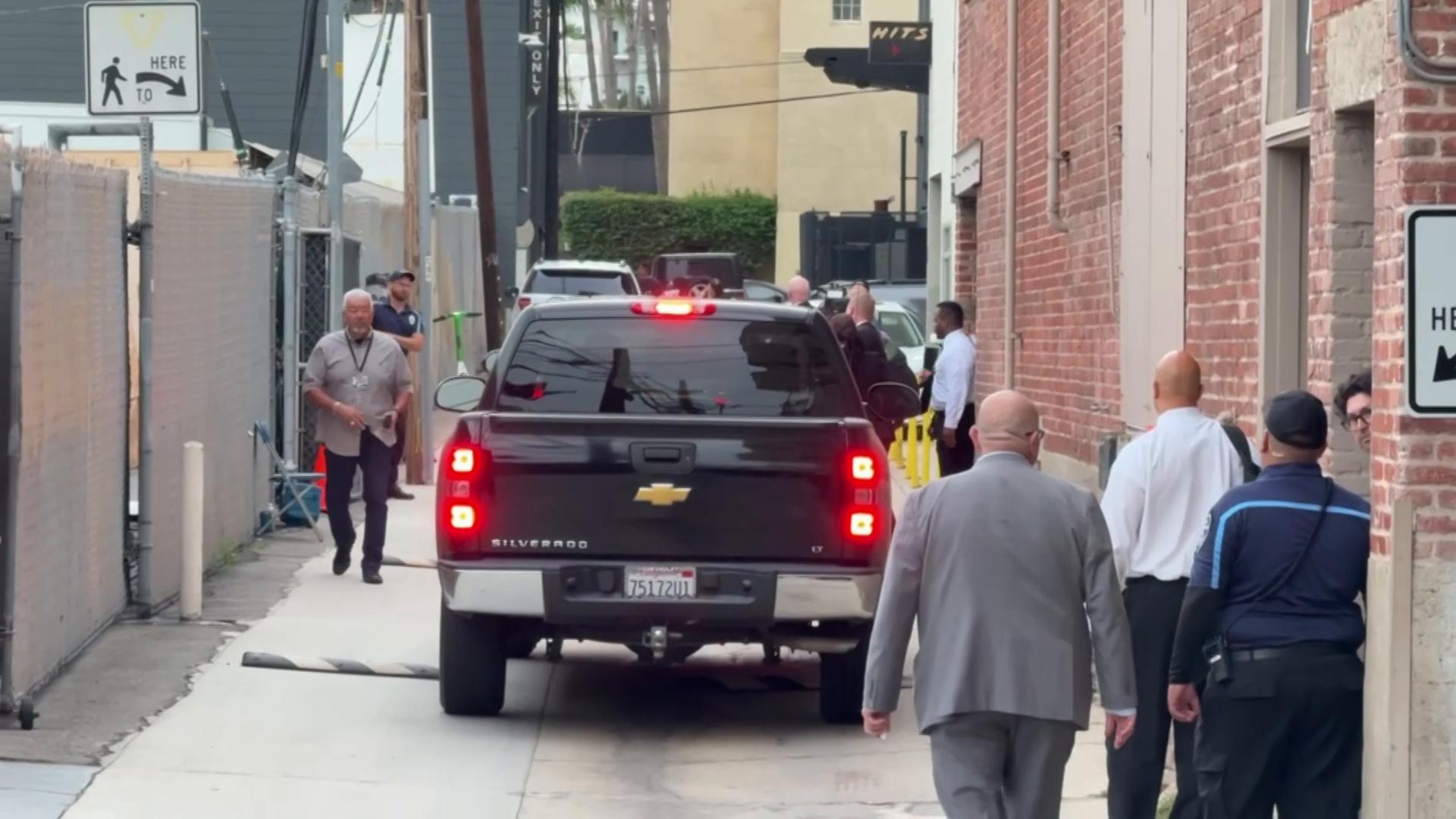 Protesters gather as Jimmy Kimmel departs his studio after suspension of late
