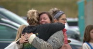 'We all live here. We all love here': Community holds vigil one day after Evergreen HS shooting