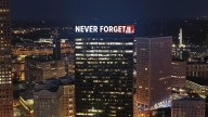 Words 'Never Forget' illuminated on Atlanta building, stadium stair climbs honor victims of 9/11
