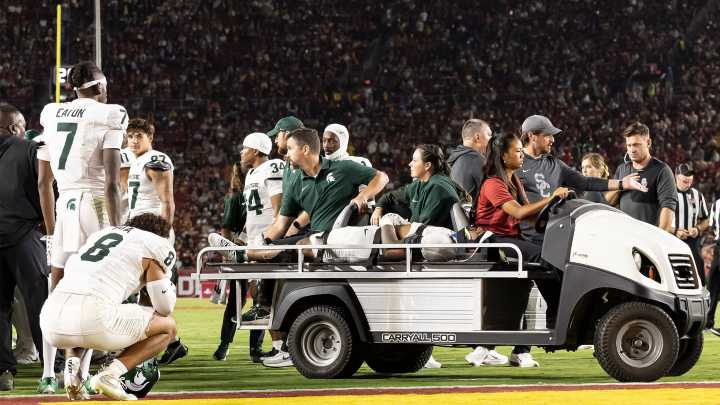 Wayne Matthews injury update after Michigan State star is left motionless on field after horrific collision in USC game