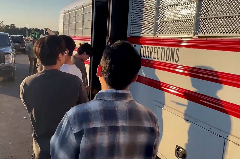 South Korea asks US to let detained workers leave without handcuffs