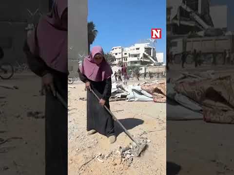 Palestinian Residents Search Remains After Israel Strike On Gaza Building