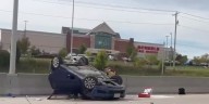 Car overturns in West Omaha crash near Village Pointe