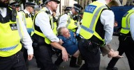Met Police say officers 'punched, kicked, spat on and had objects thrown at them' during Palestine protest