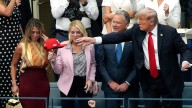 Trump signs autographs at US Open