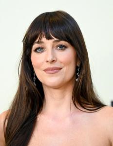 Dakota Johnson Turned Heads With a Backless Pink Mini