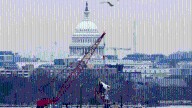 First lawsuit over DC plane crash blames the airline, the FAA and the Army