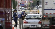 ICE officer fatally shoots suspect after being dragged by car near Chicago, officials say