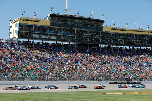 Elliott steals Kansas Speedway race in wild overtime finish, secures spot in 3rd round of playoffs