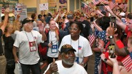 A patriotic 'welcome home' for Space Coast Honor Flight veterans at MLB