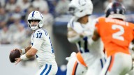 Daniel Jones impresses Zaire Franklin, who stands behind Anthony Richardson