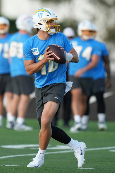 Chargers coach Jim Harbaugh say he's excited about the opportunity to play on 'a world stage'