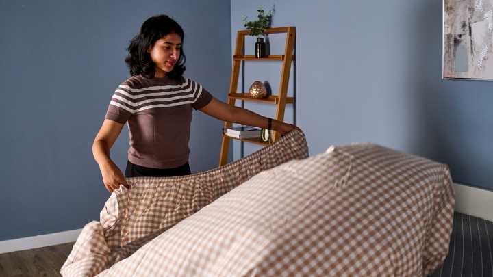 How to fold a fitted sheet in just 5 steps, according to a bedding expert