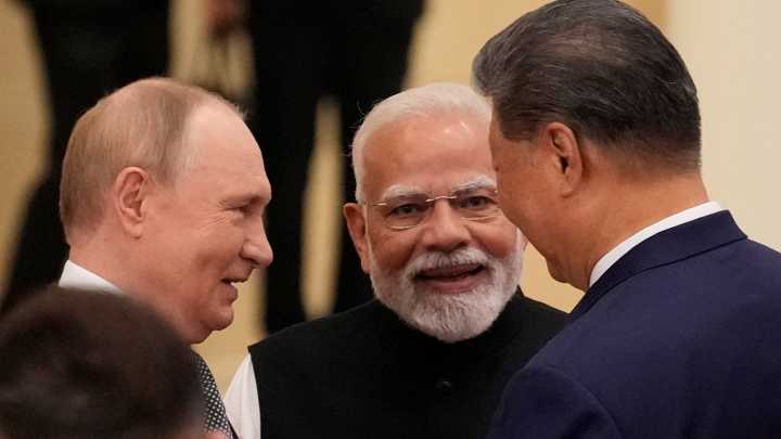 Xi, Putin and Modi pledge unity at summit to counter US