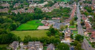 Multiple UK schools locked down after cops launch major manhunt as helicopter called in