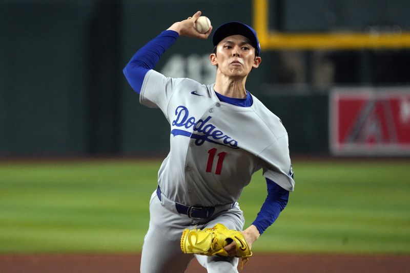 11-inning win over D-backs leaves Dodgers on verge of NL West title