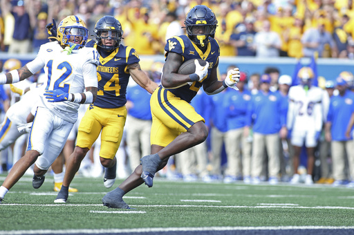 Edwards' short TD run in overtime leads West Virginia over Pittsburgh 31