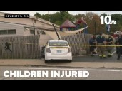 Five children injured after car crashes through fence of child care center