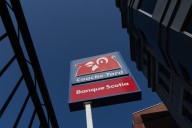 Alimentation Couche-Tard earnings fall after pulling Seven & i Holdings bid