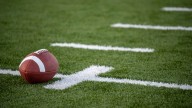 Fairfax High School football team banned from postseason play for recruiting violation