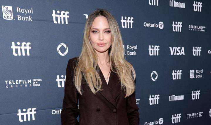 Angelina Jolie Bares Leg in Trenchcoat Dress at TIFF Premiere of New Movie ‘Couture’ | 2025 Toronto International Film Festival, Angelina Jolie