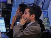 Stocks wobble as Wall Street wrangles with whether the job market is too weak
