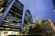 Stocks up and dollar down as data seals US rate cut