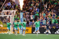 Sounders clinch playoff berth after battling Whitecaps to 2