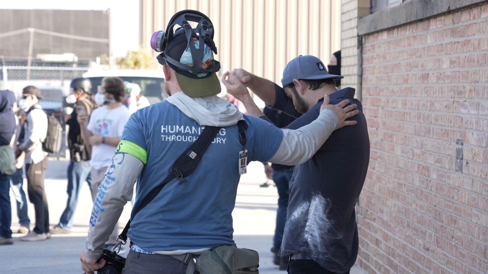 Federal agents fire chemicals as protesters hang signs, try to block car at immigration site outside Chicago
