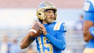College football quarterback indefinitely suspended after being arrested over assault with deadly weapon charge