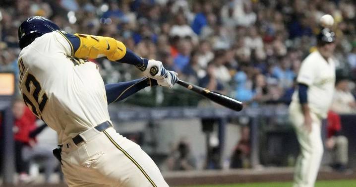 Yelich gets his 100th RBI as Brewers beat Angels 5