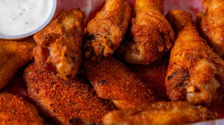 Where Hot Ones' Chicken Wings Come From (And Why It's Not Always The Same Spot)