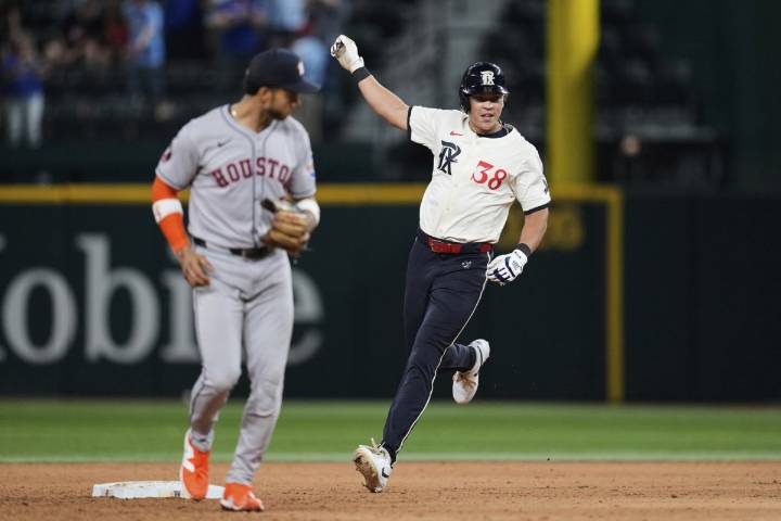 Rangers outlast AL West-leading Astros 4-3 in 12 innings to move closer to playoff spot