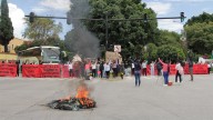 Aseguran normalistas de Teteles que infiltrados quemaron el camión de RUTA
