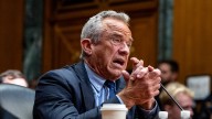 Tense moment RFK Jr tears down Elizabeth Warren's arguments as Health Sec tells Dems they did 'nothing' to protect kids