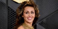Miley Cyrus, 32, Poses in Sheer Black Beaded Dress in New Photos