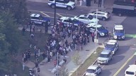 Large police presence at UMass Boston, school telling people to avoid area near residence hall building