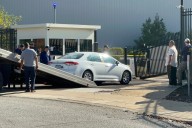 Suspect in custody after driver rams car into staffed security gate at FBI building in Pittsburgh