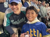Random act of kindness: Mariners fan gifts historic ball to young stranger