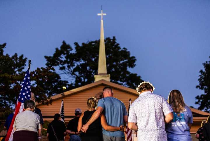 ‘The amount of violence is just heartbreaking’: Vigil held for dead, injured York County officers